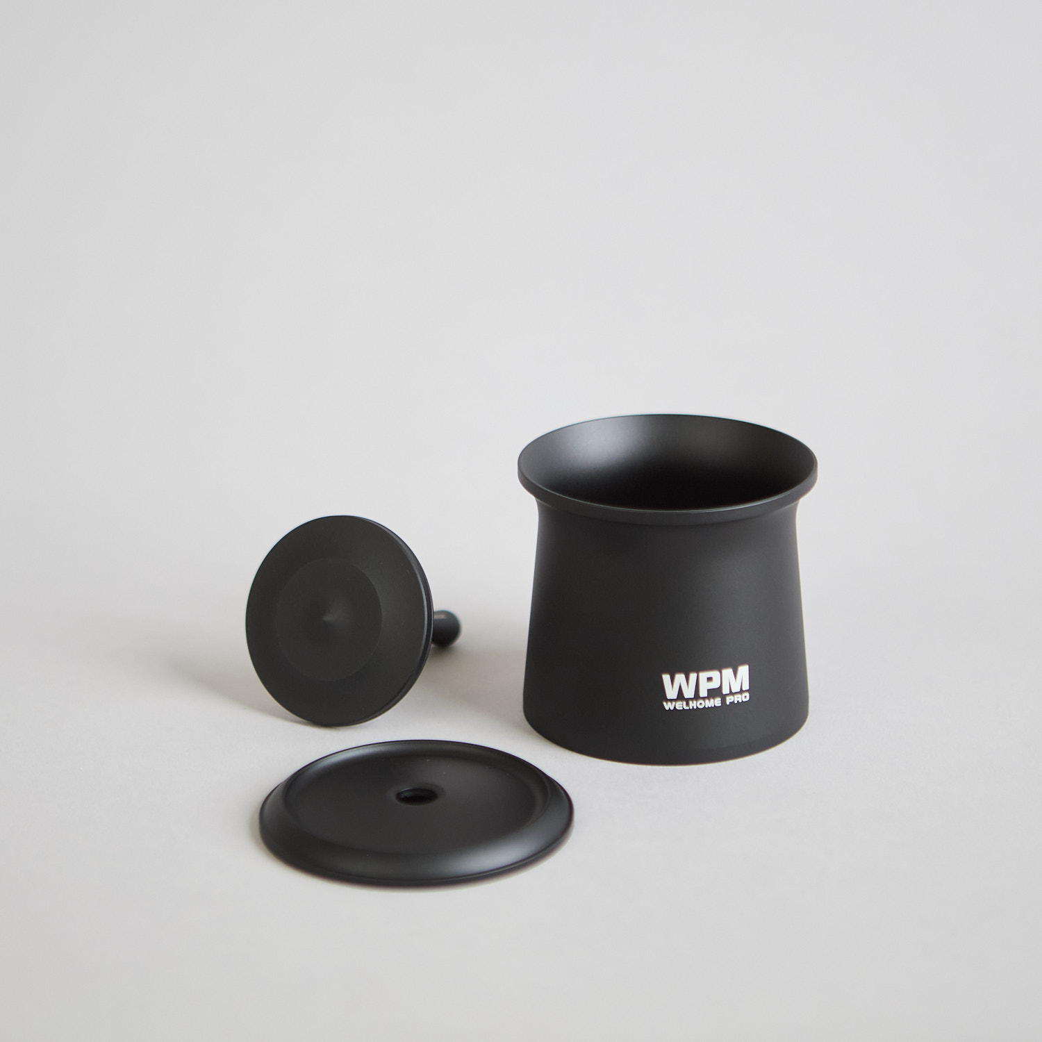 Schwarzer WPM dosing cup von WPM