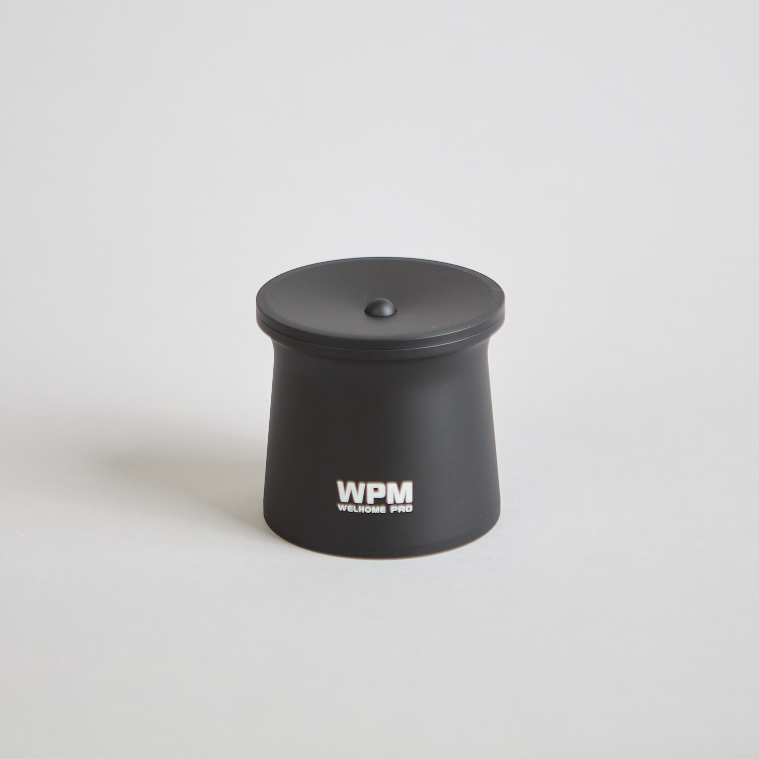Schwarzer WPM dosing cup von WPM
